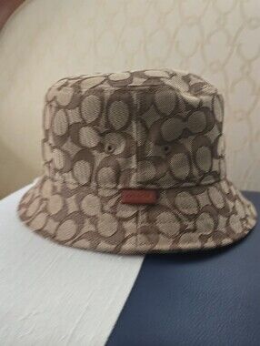 Coach Signature Monogram Bucket Hat in Brown and Tan